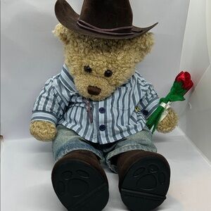 Build-A-Bear Workshop teddy bear dressed in a cowboy outfit. 
with Hat and Rose